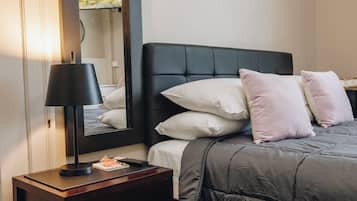 Habitación familiar, baño compartido | Wifi gratis y ropa de cama