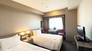 Economy Twin Room, Non Smoking | Down comforters, desk, blackout drapes, free WiFi