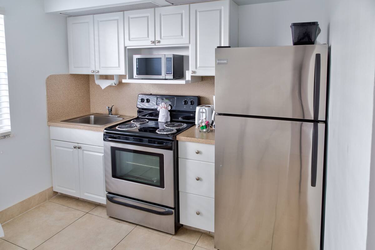 microwave, coffee/tea maker, toaster, freezer