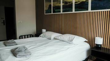 Premium bedding, in-room safe, individually furnished, blackout drapes