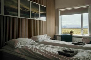 Roba de llit d'alta qualitat i caixa forta a l'habitació 