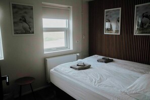 Roupas de cama premium, cofres nos quartos, individualmente mobiliados