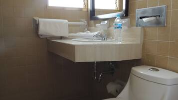 Shower, free toiletries, towels, soap