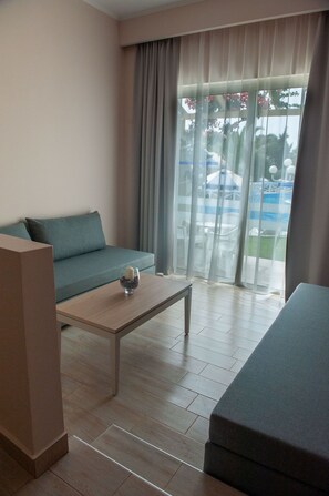 30-inch flat-screen TV with satellite channels, TV