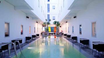 Outdoor pool, open 6:00 AM to 8:00 PM, sun loungers