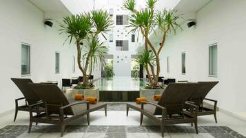 Outdoor pool, open 6:00 AM to 8:00 PM, sun loungers