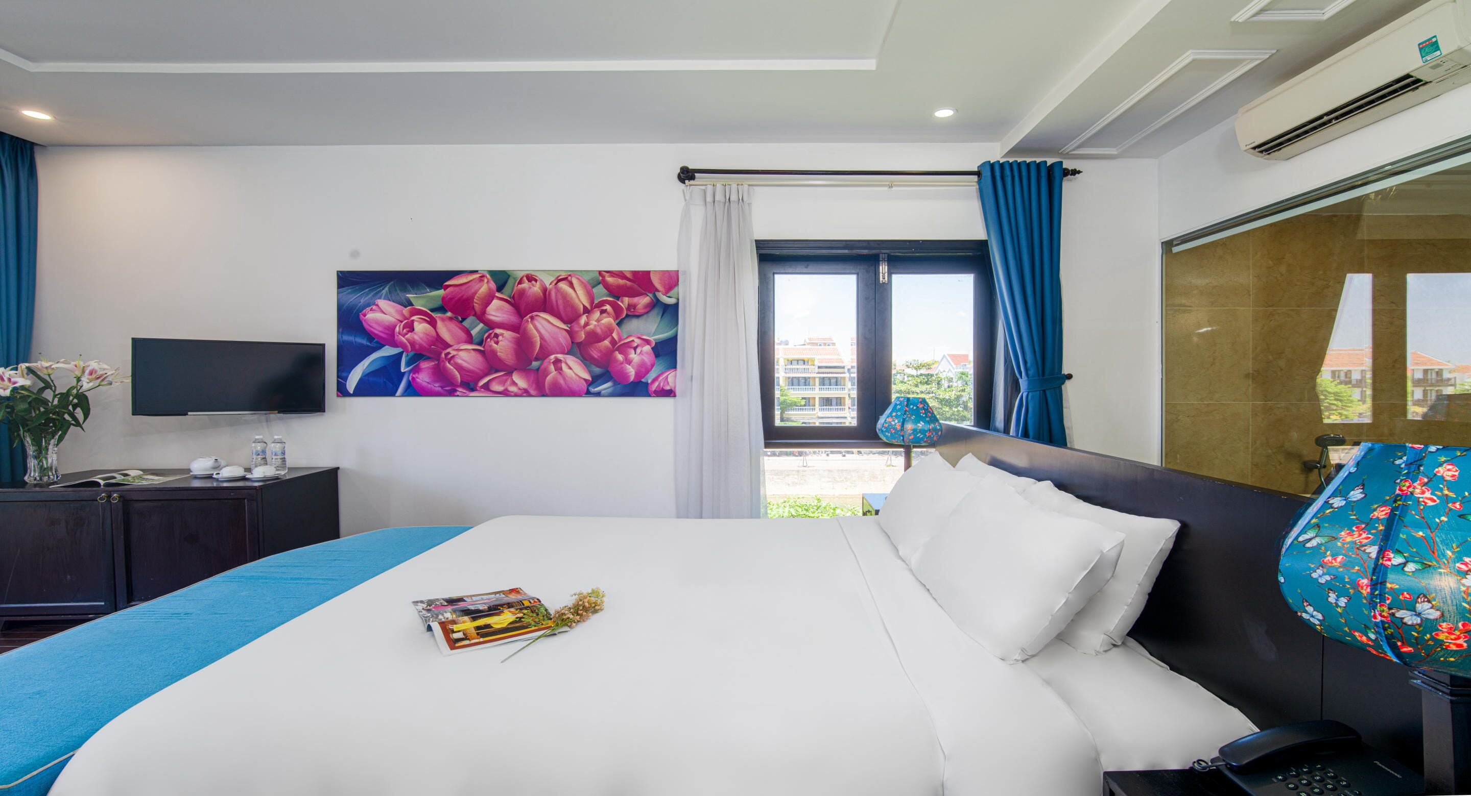 king room, pool view and river view with balcony and bathtub | premium bedding, minibar, in-room safe, individually decorated