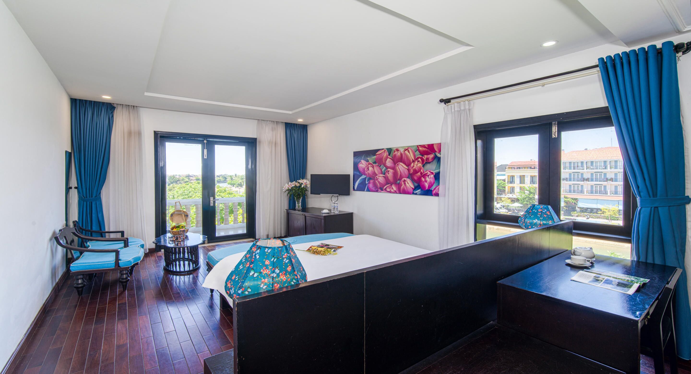 king room, pool view and river view with balcony and bathtub | premium bedding, minibar, in-room safe, individually decorated