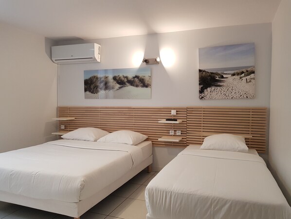 ファミリー ルーム | ミニバー、デスク、アイロン / アイロン台、WiFi (無料)