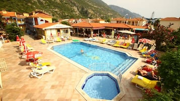 Outdoor pool, pool umbrellas, pool loungers