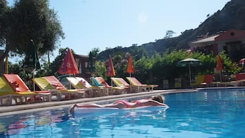 Outdoor pool, pool umbrellas, sun loungers
