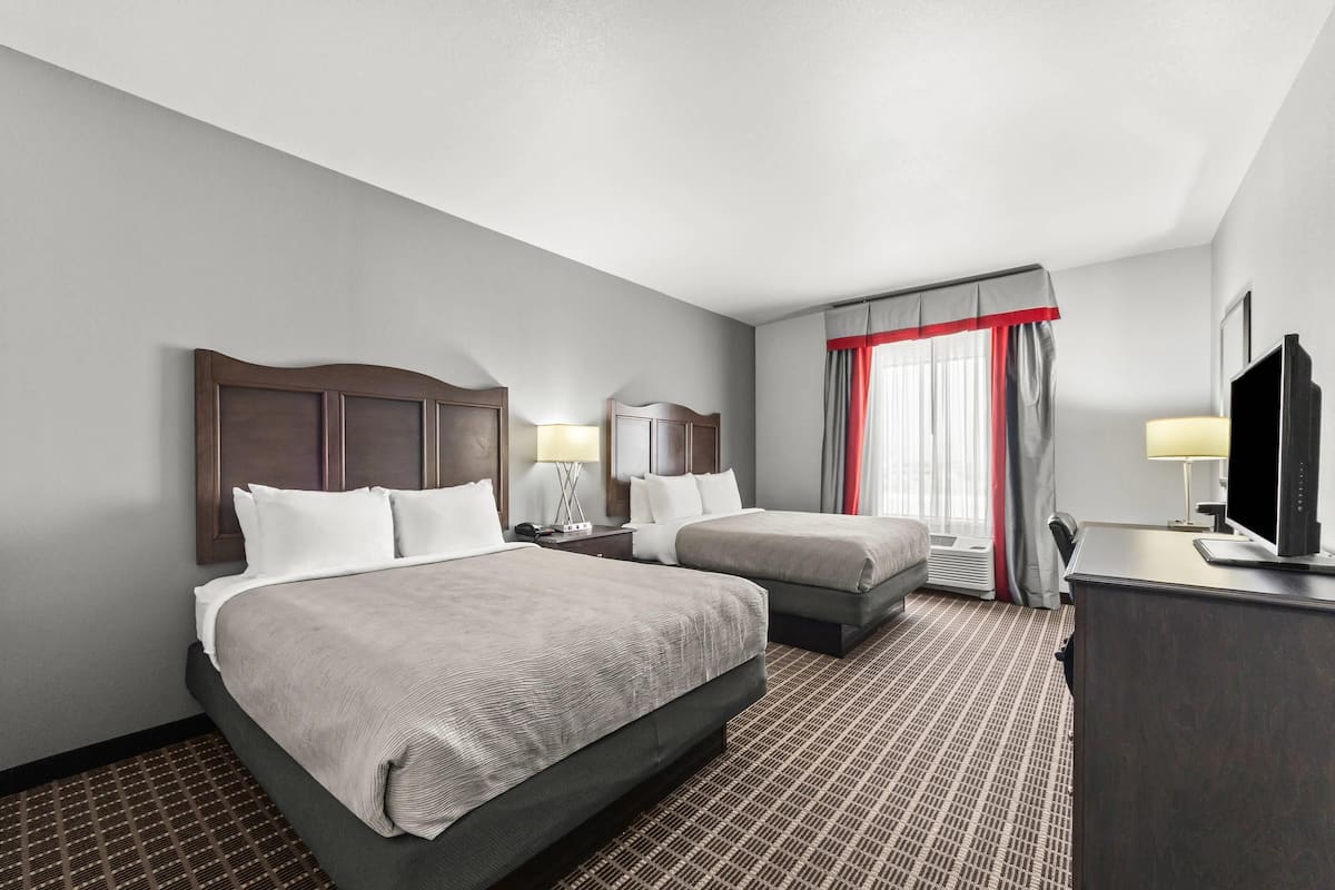 Standard Room, 2 Queen Beds, Smoking | Blackout drapes, soundproofing, iron/ironing board, free WiFi