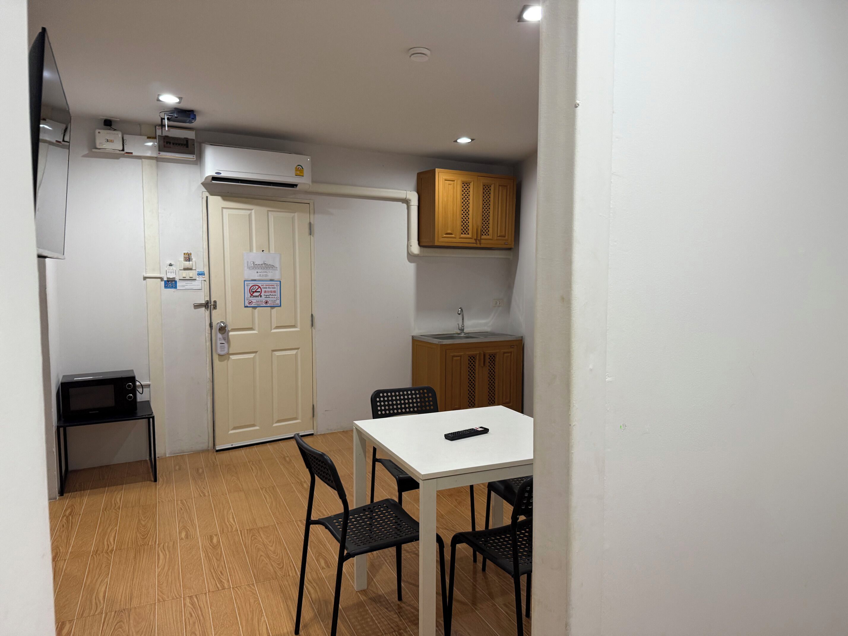 family room | 1 bedroom, minibar, in-room safe, desk