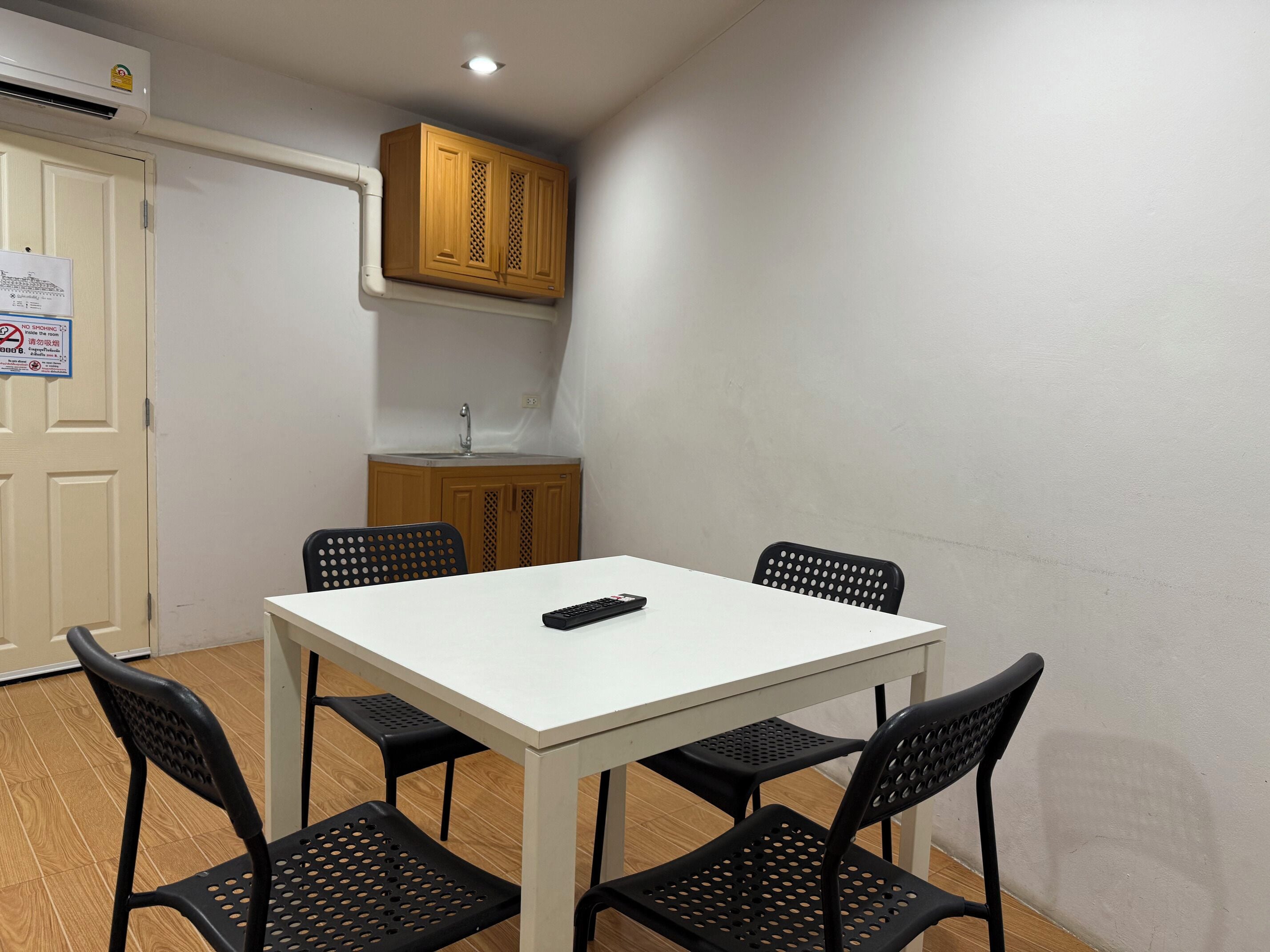 family room | 1 bedroom, minibar, in-room safe, desk