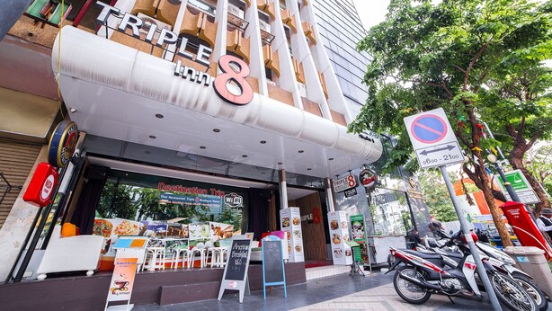 A restaurant with a sign reading "TRIPLE 8" and "Destination Trip Thai Restaurant." - Triple 8 Inn Bangkok (Bangkok)
