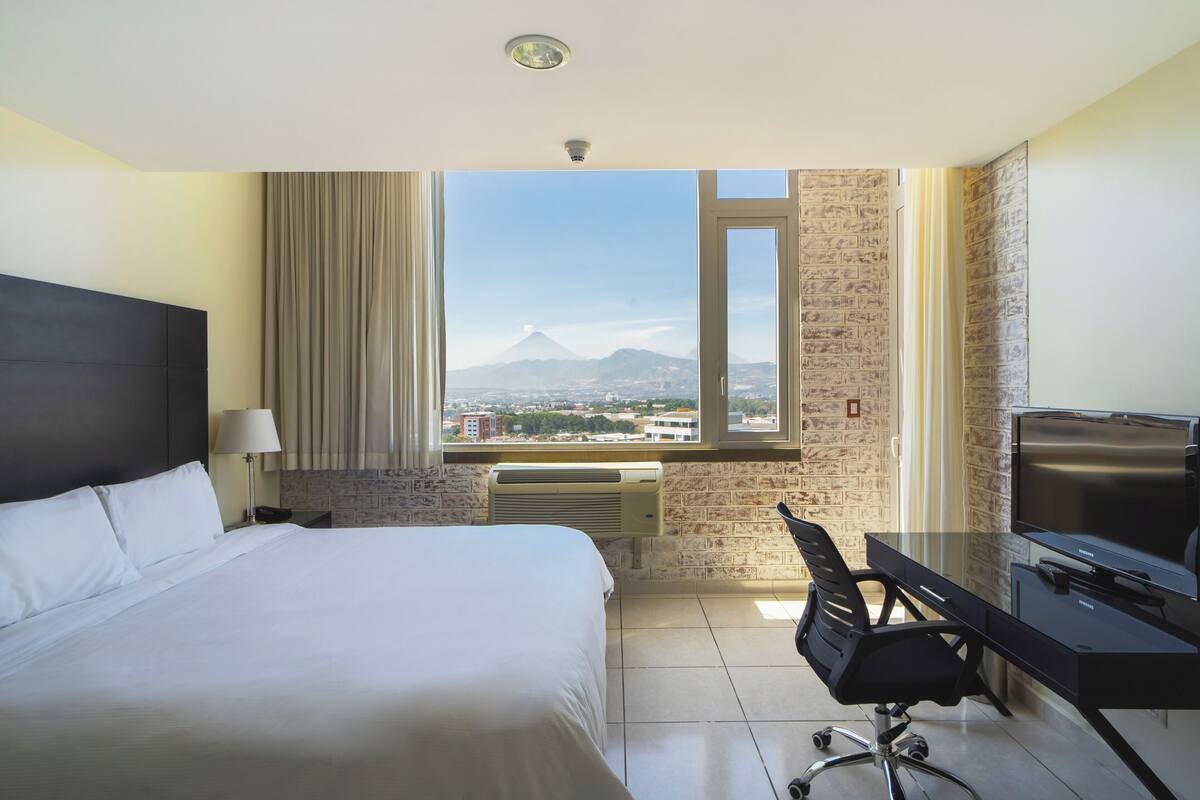 family suite, 2 bedrooms, kitchenette, city view (1 king bed & 2 twin beds) | 2 bedrooms, in-room safe, desk, soundproofing