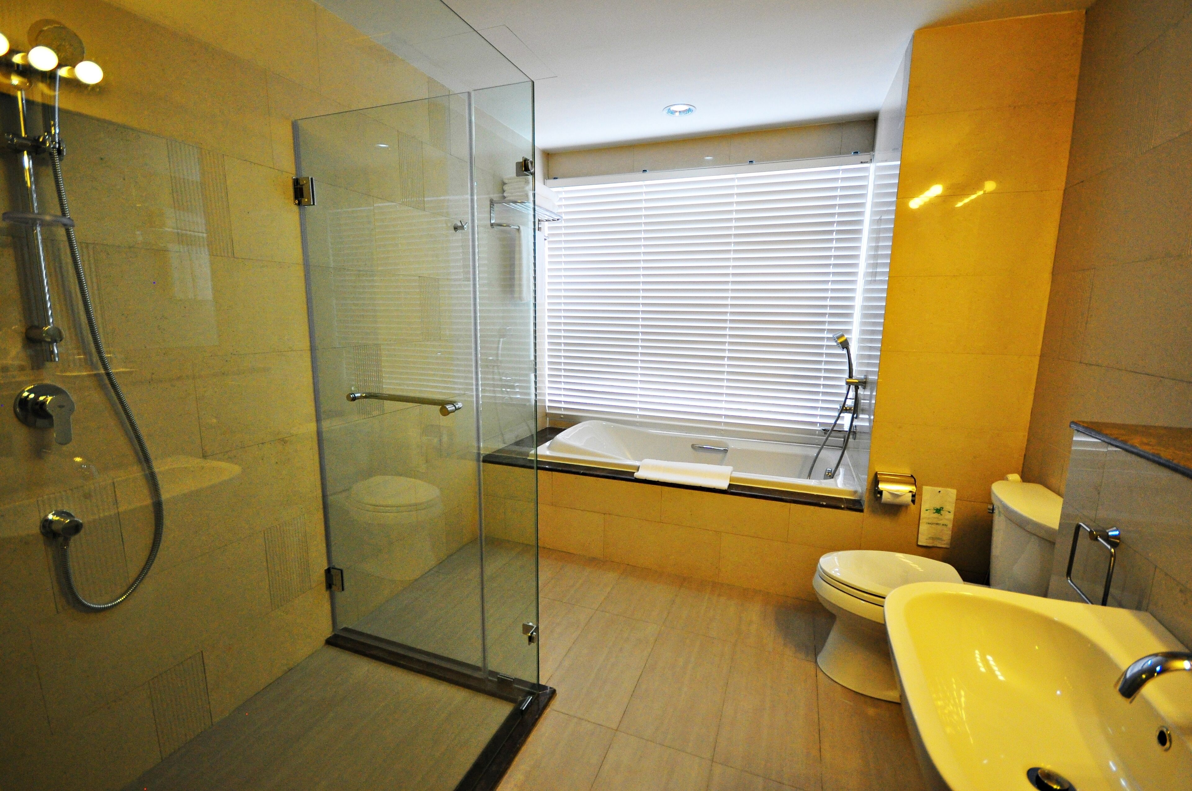 premium suite | bathroom | separate bathtub and shower, deep-soaking bathtub, hair dryer, slippers