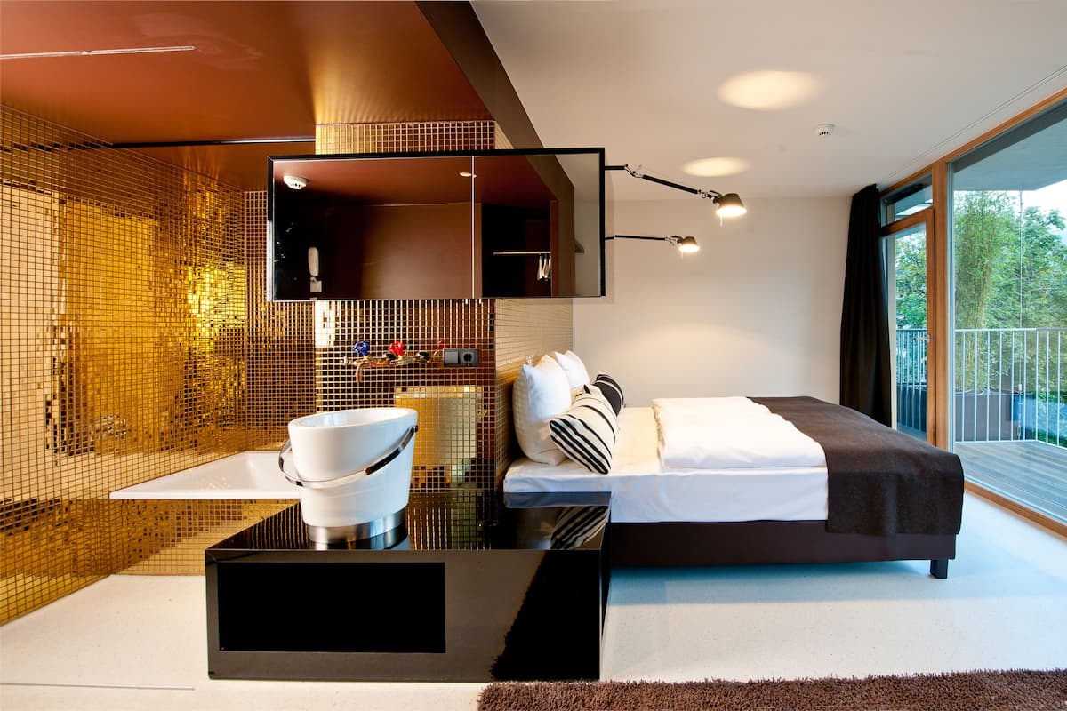 Designer toiletries, hair dryer, towels