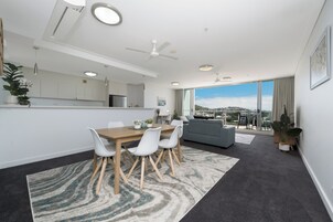 Apartment, 2 Bedrooms | Living area | 49-inch flat-screen TV with digital channels