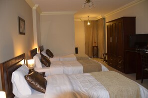 Deluxe Triple Room | Memory foam beds, minibar, in-room safe, desk - Saint John Hotel (Madaba)