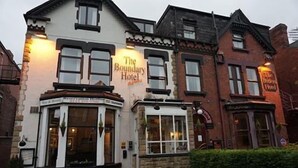 The Boundary Hotel with a traditional facade, large windows, and a well-lit entrance. - The Boundary Hotel (Leeds)