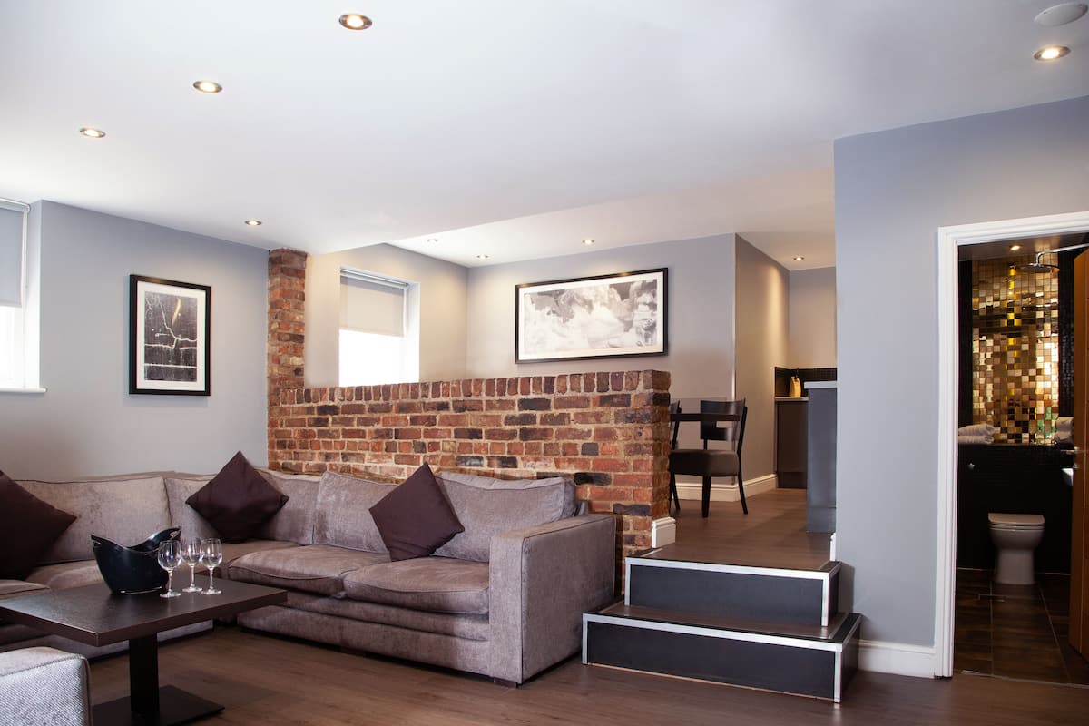 Loft Apartment - Two-bedroom duplex | Living area | Plasma TV, video-game console, iPod dock