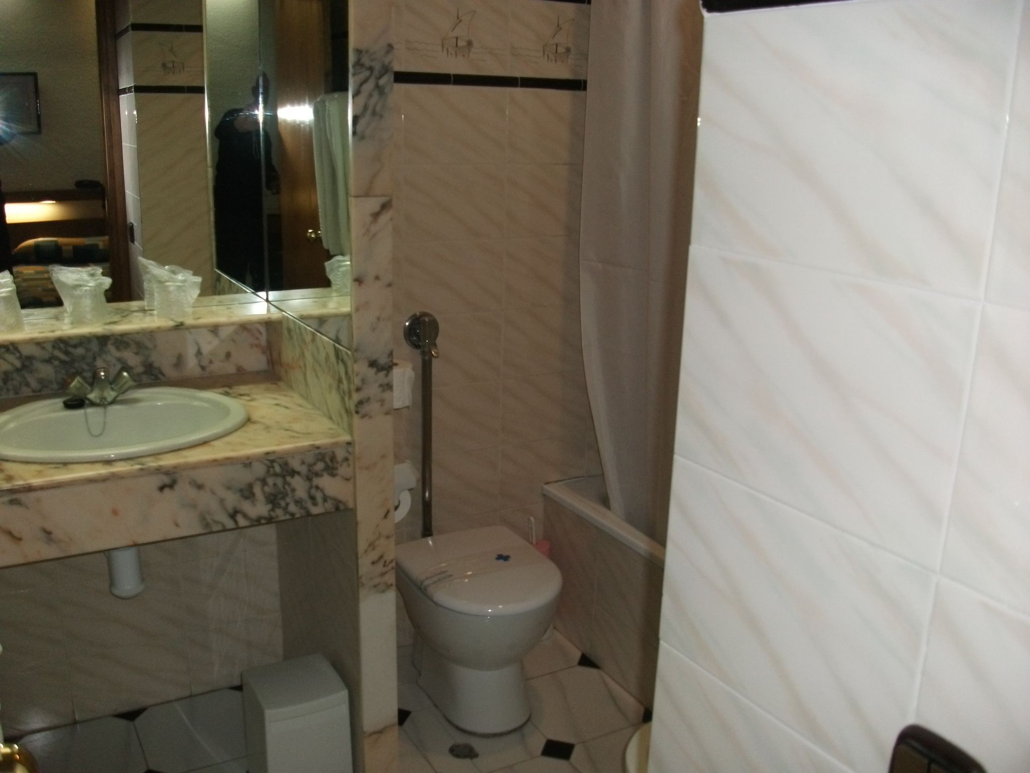 bathtub, free toiletries, hair dryer, towels