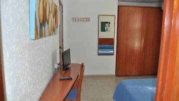 Desk, blackout curtains, free WiFi, bed sheets