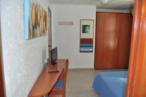 Desk, blackout curtains, free WiFi, bed sheets
