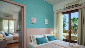 A hotel room with two beds, a balcony with a table and chairs, and a view of palm trees. - Alkion Hotel (Chania)