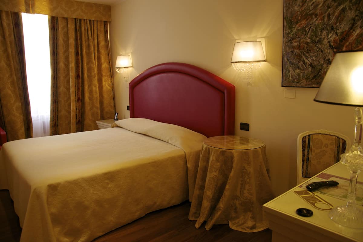 Biancheria da letto di alta qualità, minibar, una cassaforte in camera