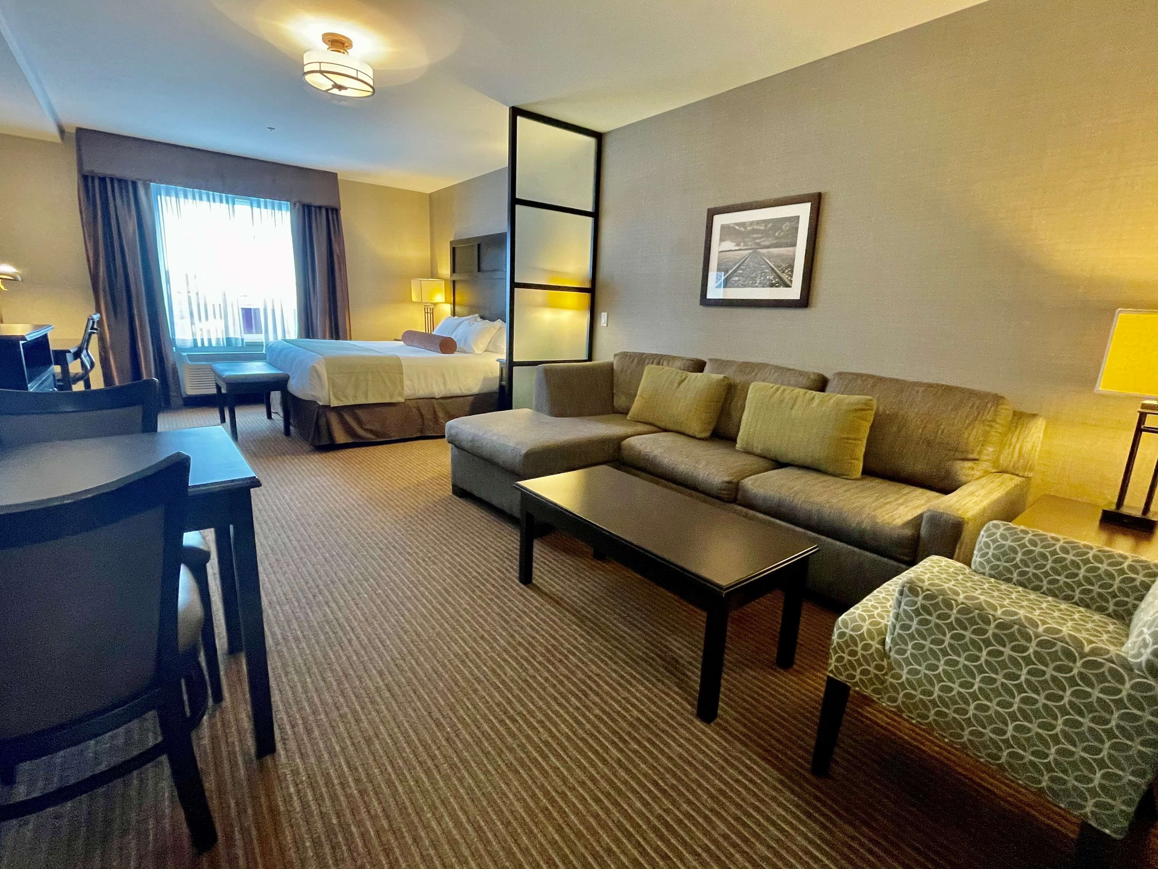 suite, 1 king bed, non smoking, kitchenette | premium bedding, pillow-top beds, in-room safe, desk