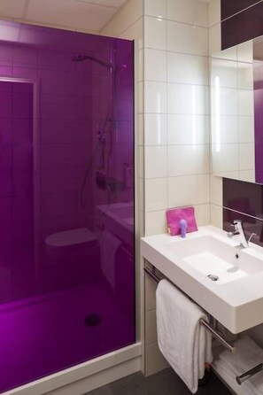 Shower, eco-friendly toiletries, hair dryer, towels