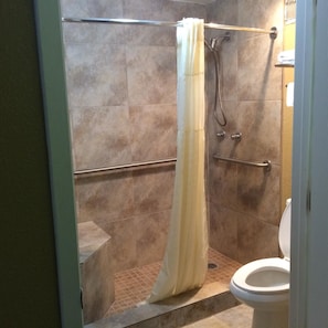 Room, 2 Double Beds, Accessible, Non Smoking | Bathroom | Combined shower/tub, free toiletries, hair dryer, towels
