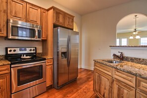 Grand Condo, 2 Bedrooms, Jetted Tub | Private kitchen | Fridge, microwave, coffee/tea maker, cookware/dishes/utensils