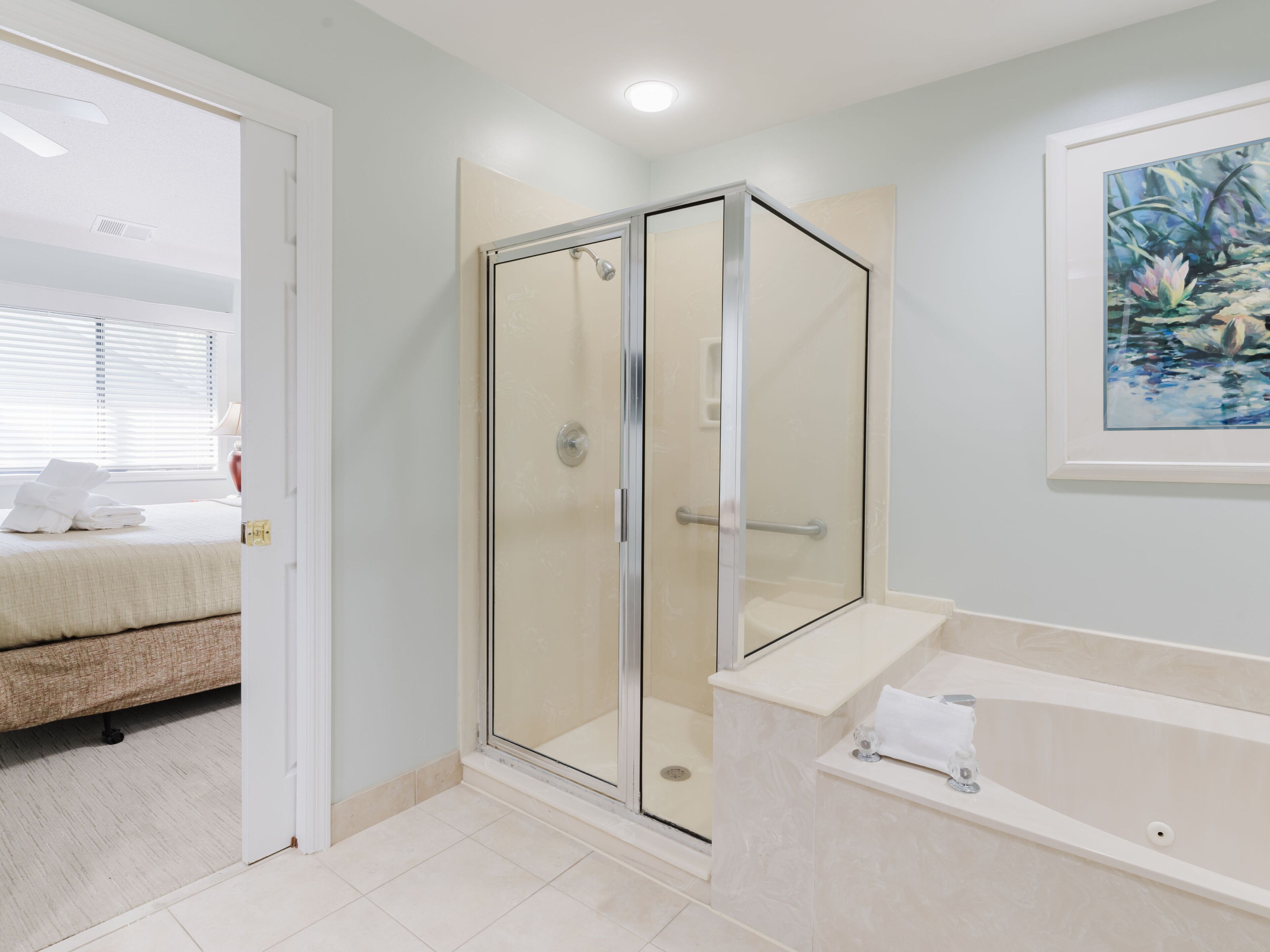 Basic Townhome | Bathroom | Separate bathtub and shower, hair dryer, slippers, towels