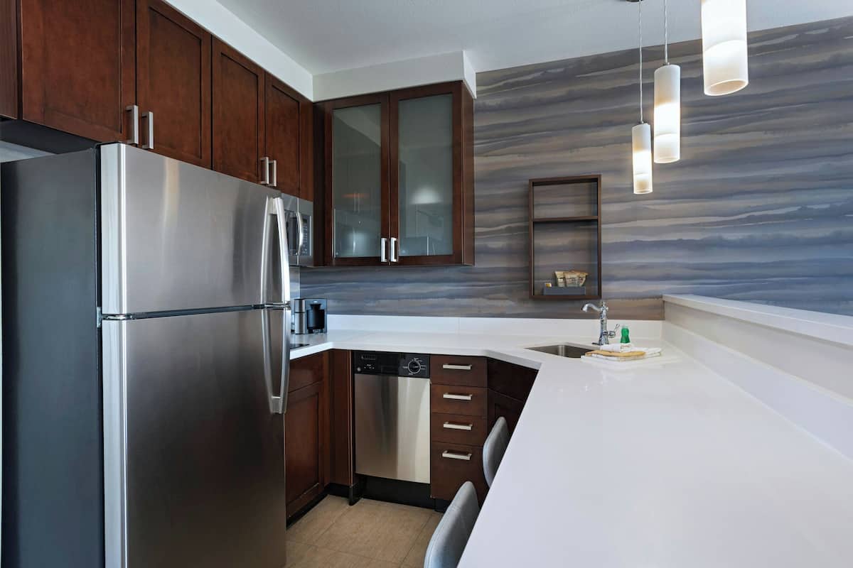 studio, 1 king bed with sofa bed | private kitchen | full-sized fridge, microwave, stovetop, dishwasher