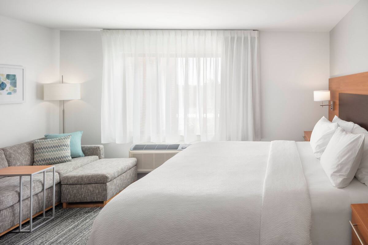 desk, laptop workspace, blackout curtains, iron/ironing board