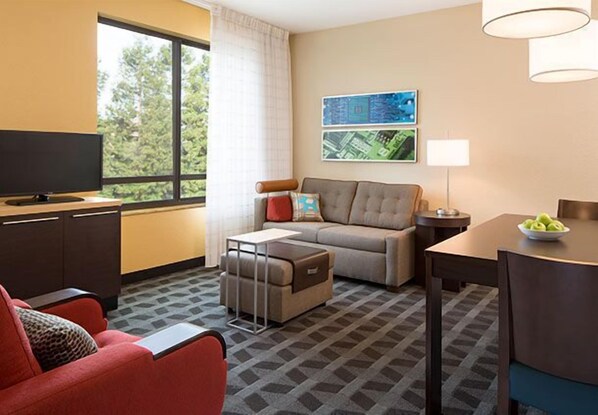 Suite, 2 Bedrooms | Living area | 32-inch flat-screen TV with satellite channels, TV