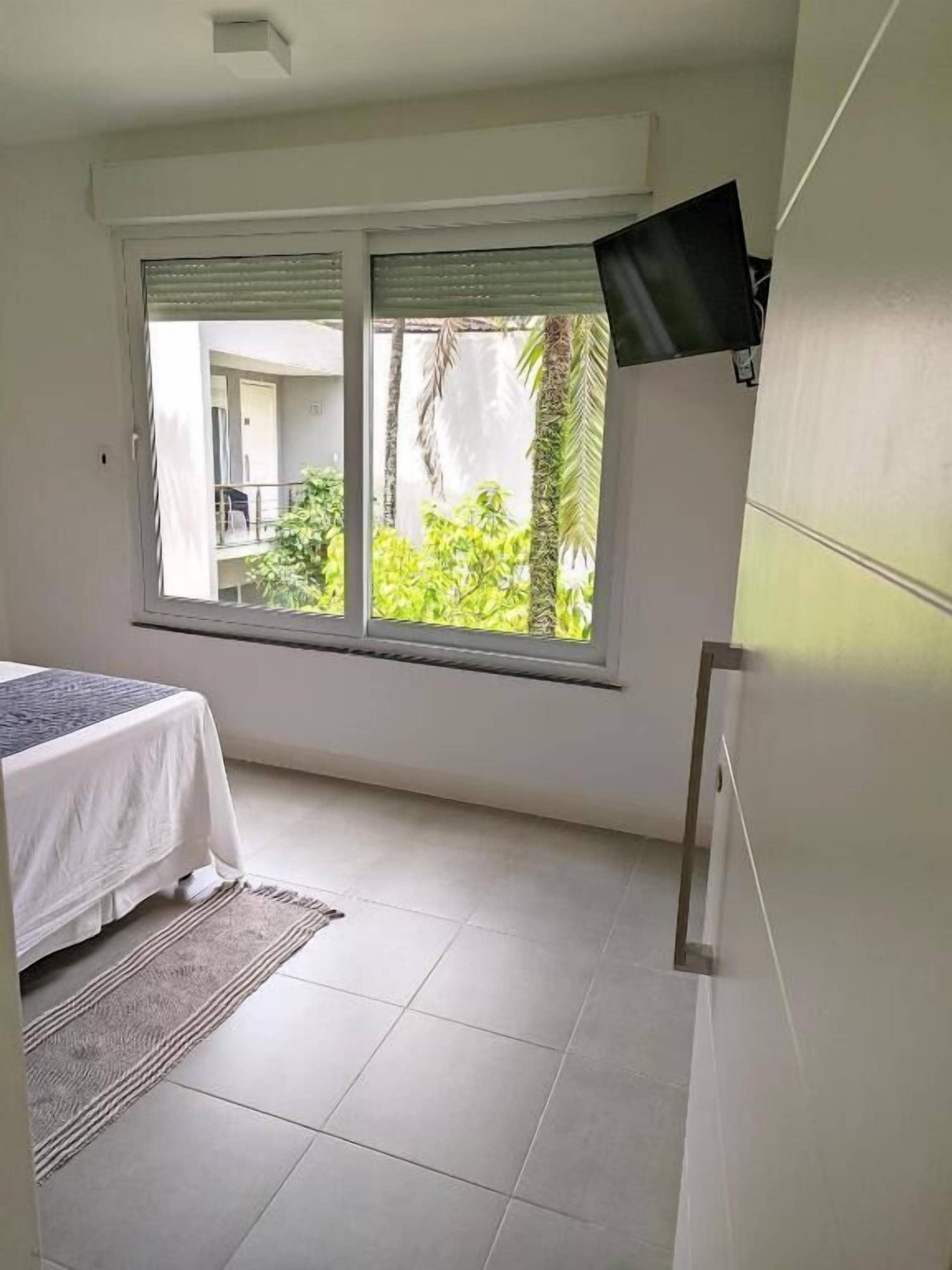 Quarto família | Frigobar, cofres nos quartos, escrivaninha, Wi-Fi de cortesia