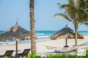 Private beach, white sand, beach umbrellas, beach towels