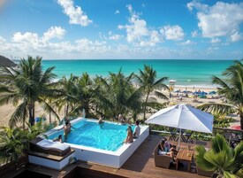 Outdoor pool, open 10:00 AM to 10:00 PM, sun loungers