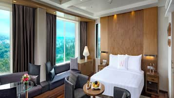 Deluxe Room, 1 Queen Bed (Deluxe Room Double) | 1 bedroom, minibar, in-room safe, desk