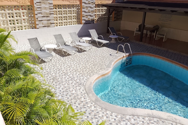 Outdoor pool, sun loungers