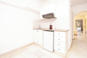 Family Quadruple Room, Garden View | Individually furnished, blackout curtains, iron/ironing board, free WiFi - Agia Anna Hotel (Naxos)