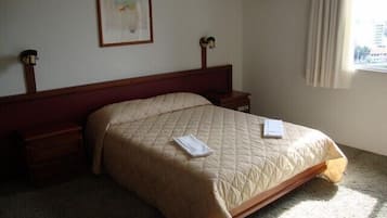 Suíte, banheira de hidromassagem | Frigobar