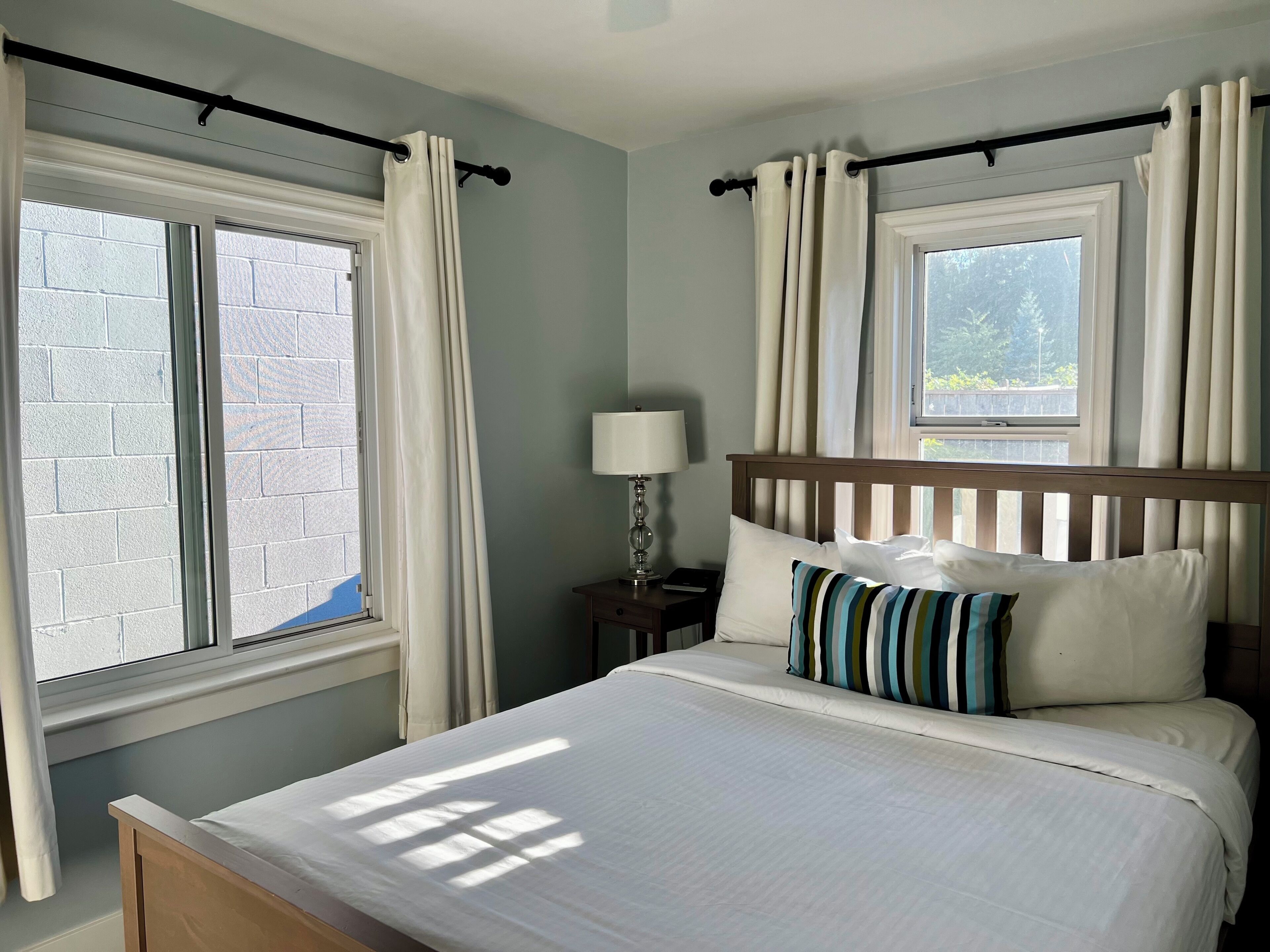 1 bedroom, premium bedding, laptop workspace, blackout curtains
