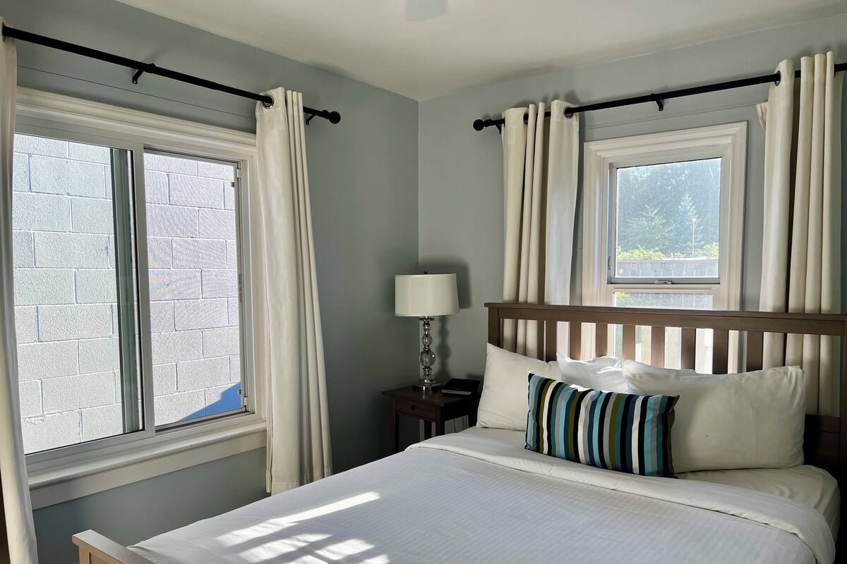 1 bedroom, premium bedding, laptop workspace, blackout drapes