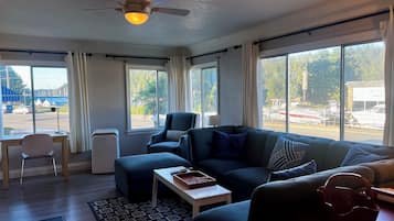 Cottage | Living area | 32-inch flat-screen TV with cable channels, fireplace