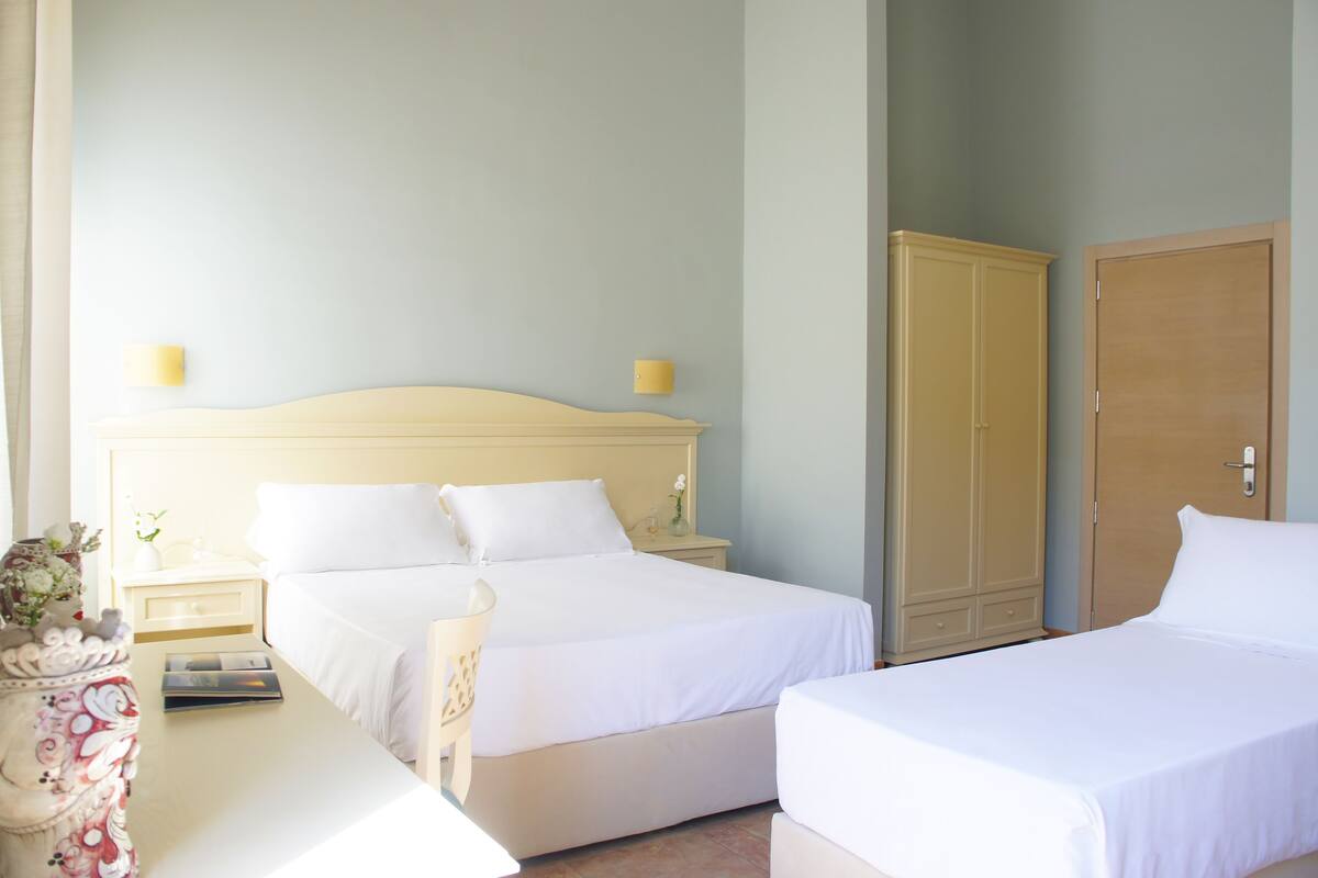 Family Room | 19 bedrooms, premium bedding, minibar, in-room safe